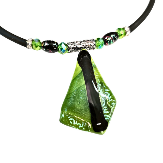 Necklace with green pendant on a white background