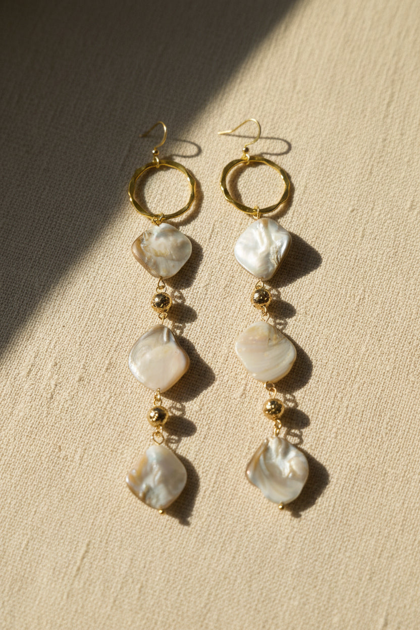 Designs by DRL Deep Water iridescent shell shoulder duster earrings 5 inch gold hardware front view